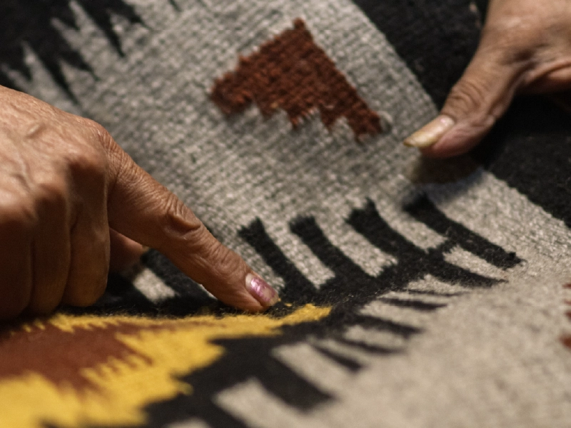 Close up image of an indigenous tapestry.